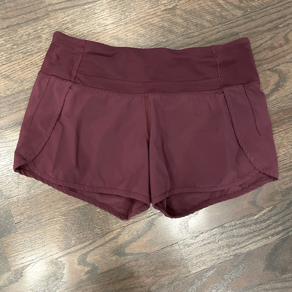 Lululemon Speed Up Shorts in Red Merlot.  Size 4, Inseam 4”